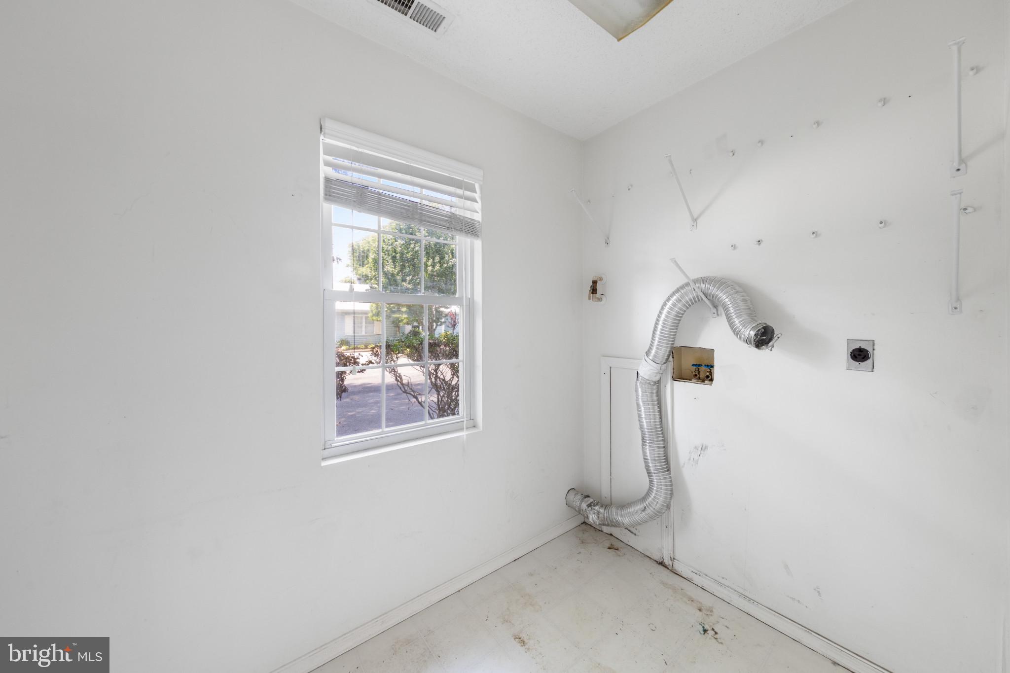 9821 Keyser Point Road, Unit 8D1 Ocean City, MD 21842 - Photo 31 of 33 Laundry