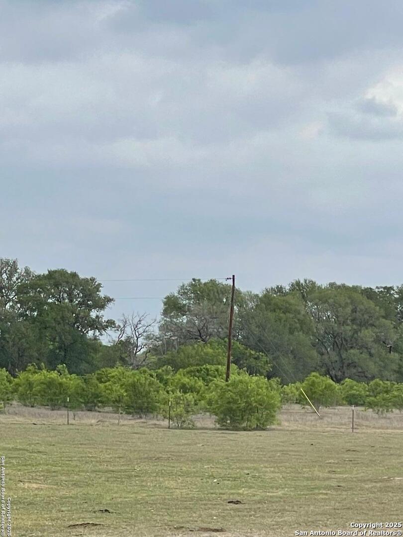 Tract 4 Hartfield Seguin, TX 78155 - Photo 8 of 8 a view of a lake from a yard