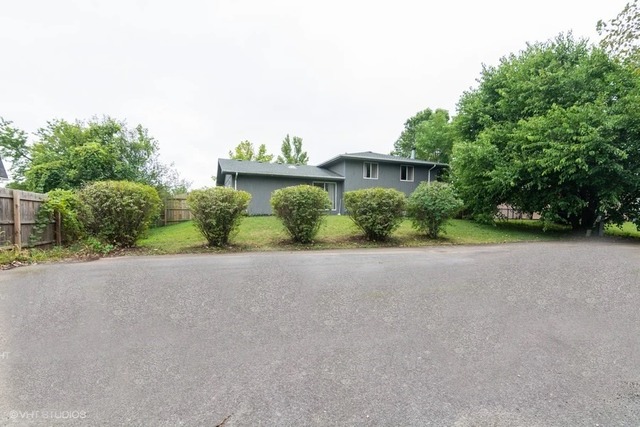 4160 Charleston Road Matteson, IL 60443 - Photo 14 of 15 a road with a house in the background