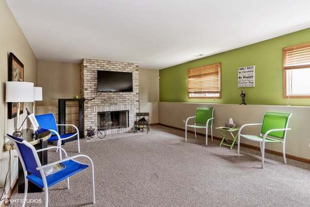 4160 Charleston Road Matteson, IL 60443 - Photo 8 of 15 a living room with furniture and a fireplace