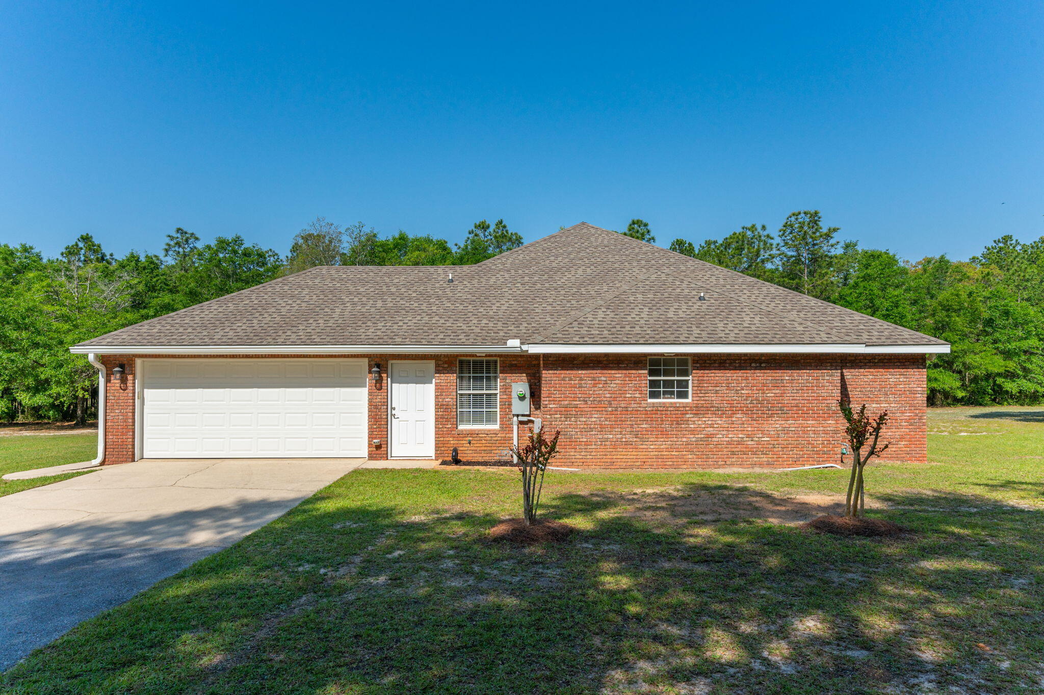 5777 Buckward Road Baker, FL 32531 - Photo 45 of 60 a front view of a house with a yard