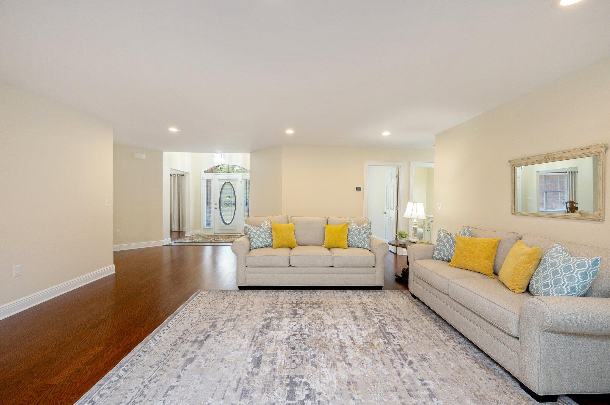 5777 Buckward Road Baker, FL 32531 - Photo 9 of 60 a living room with furniture and a couch