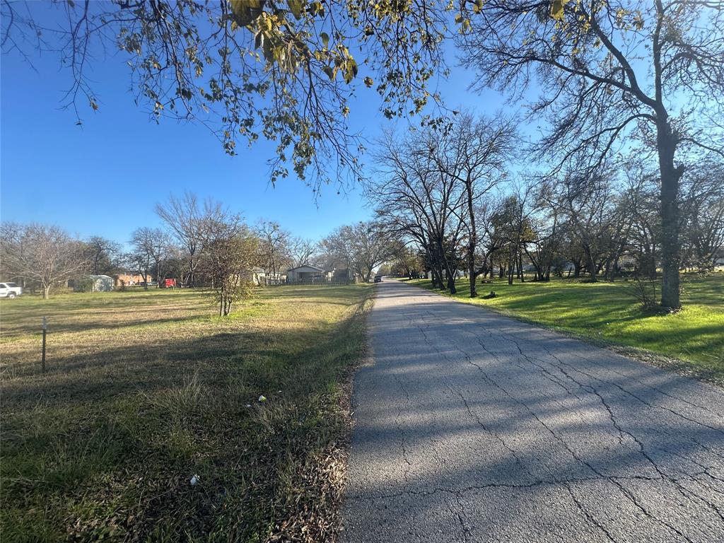 Tbd East Freeman Street Ennis, TX 75119 - Photo 4 of 11 a view of yard with green space