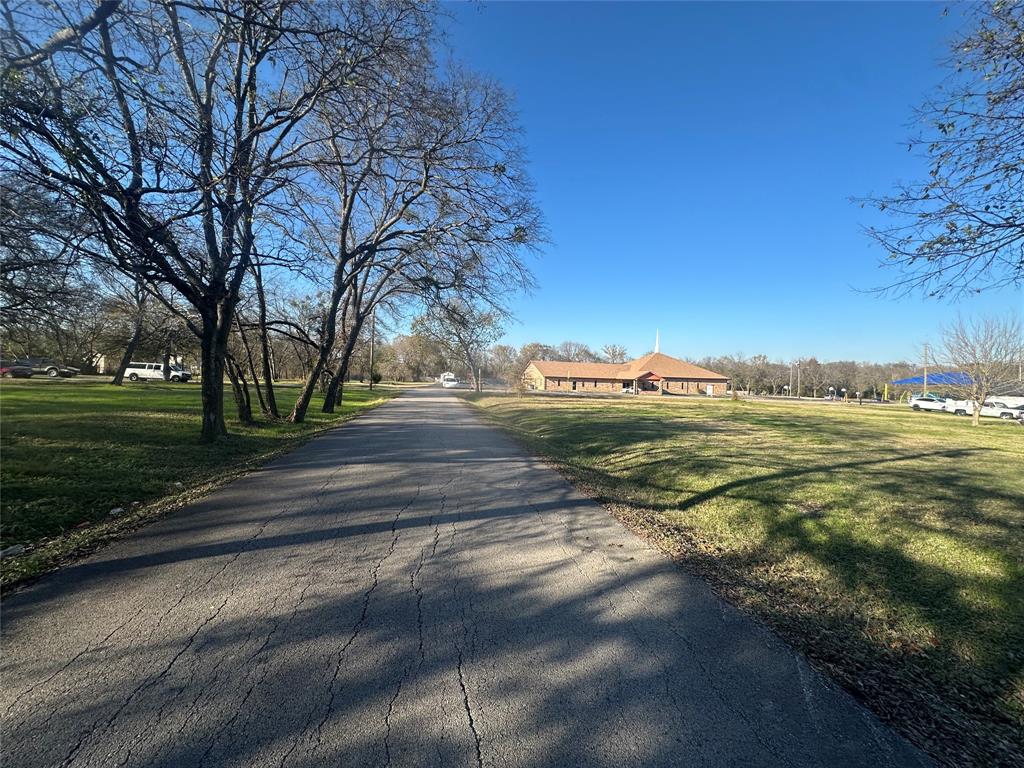 Tbd East Freeman Street Ennis, TX 75119 - Photo 7 of 11 a view of yard with tree s