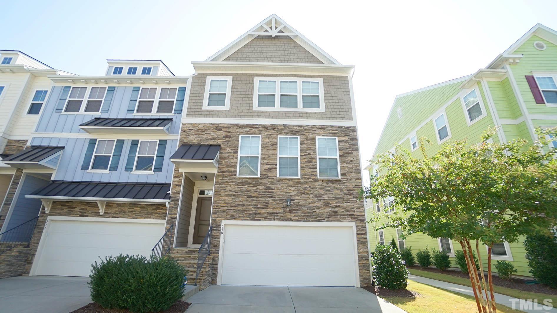 540 Metro Station Apex, NC 27502 - Photo 3 of 45 a front view of a house with a yard