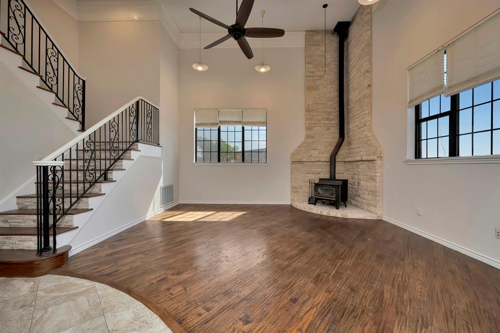 5520 White Settlement Road Weatherford, TX 76087 - Photo 16 of 39 a view of entryway and hall with wooden floor