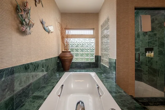 a view of a balcony with next to a yard