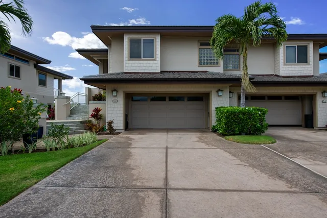 a house view with a garden space