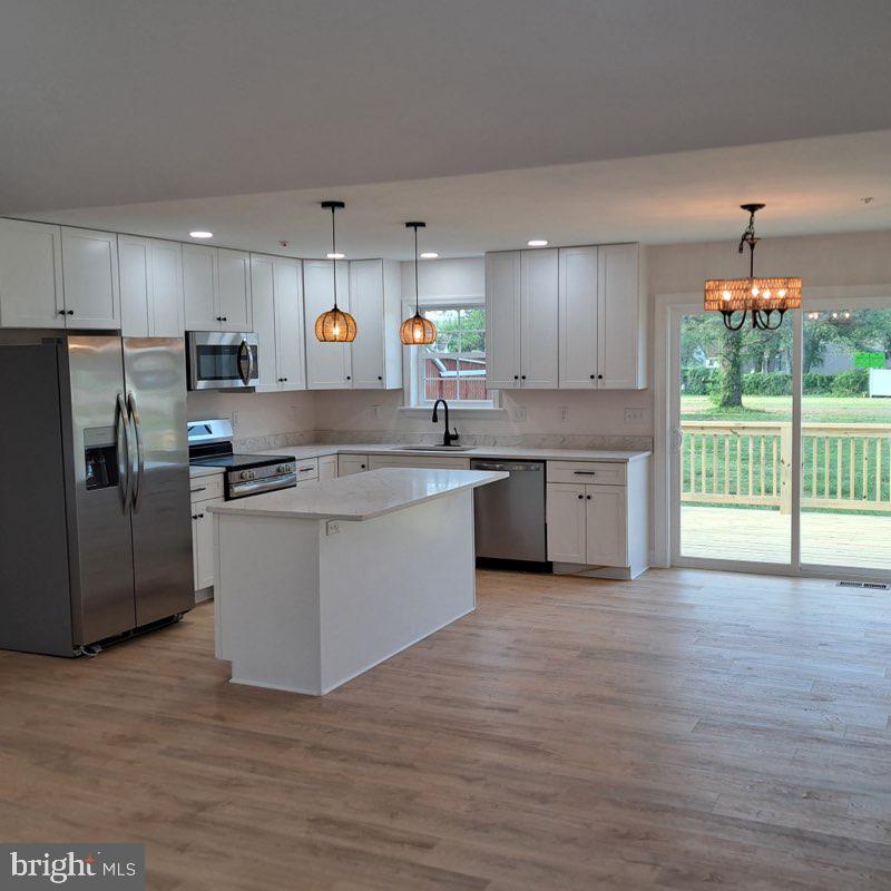 101 Thompson Street Hurlock, MD 21643 - Photo 6 of 17 Open Kitchen with Island