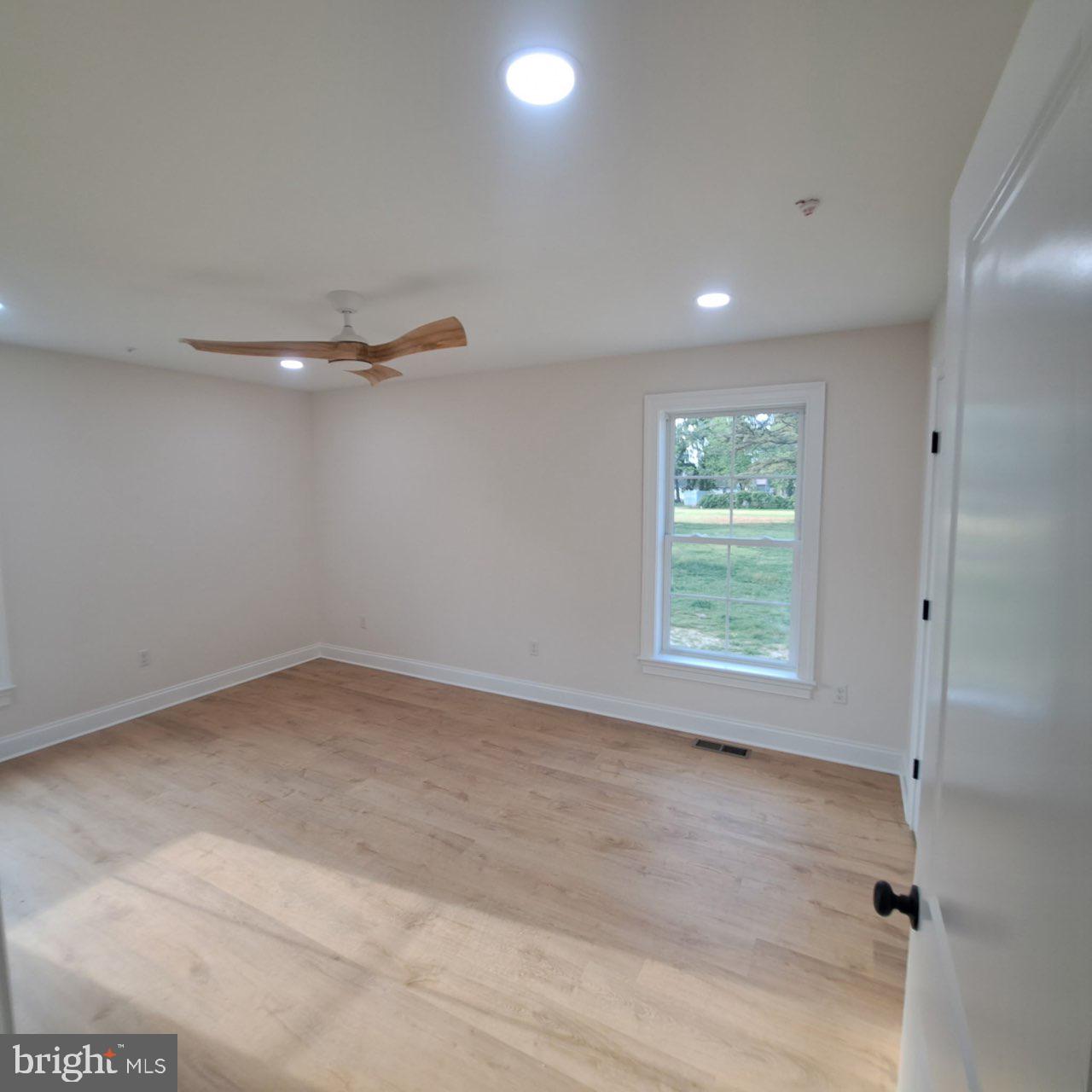 101 Thompson Street Hurlock, MD 21643 - Photo 8 of 16 a view of a room with window