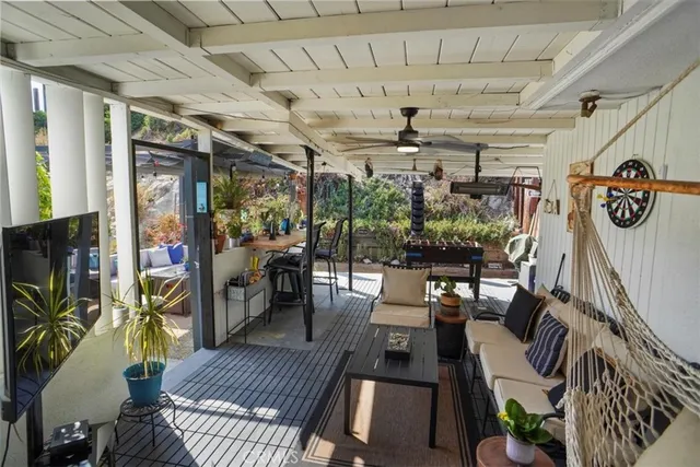 a view of a dining room with furniture window and outside view