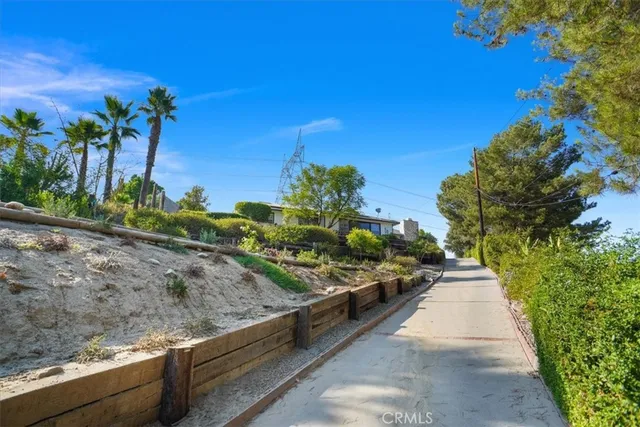 a view of a garden with an outdoor space