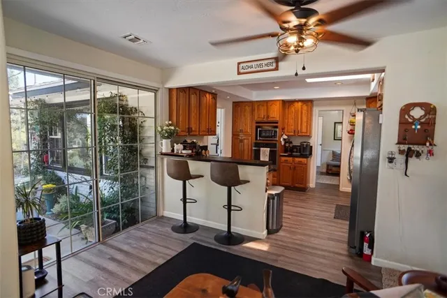 a view of a livingroom with furniture window and outside view