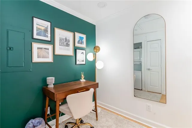 a workspace with furniture and window