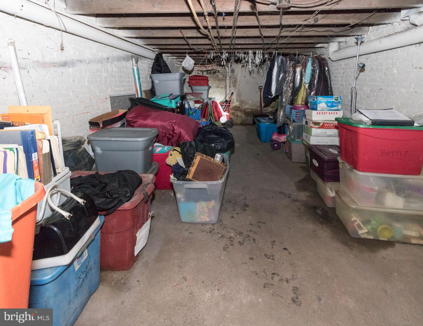 2123 East Chase Street Baltimore, MD 21213 - Photo 7 of 12 a utility room with lot of items
