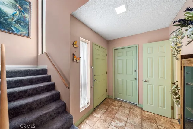 a view of entryway with stairs