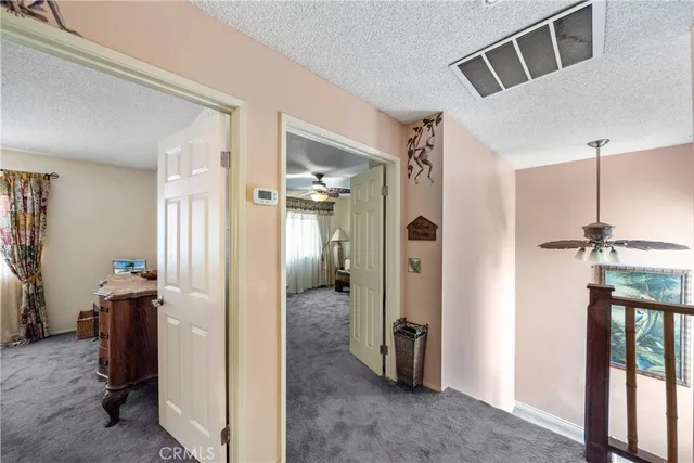 a view of entryway with livingroom