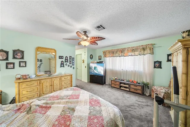 a room with a mirror and furniture