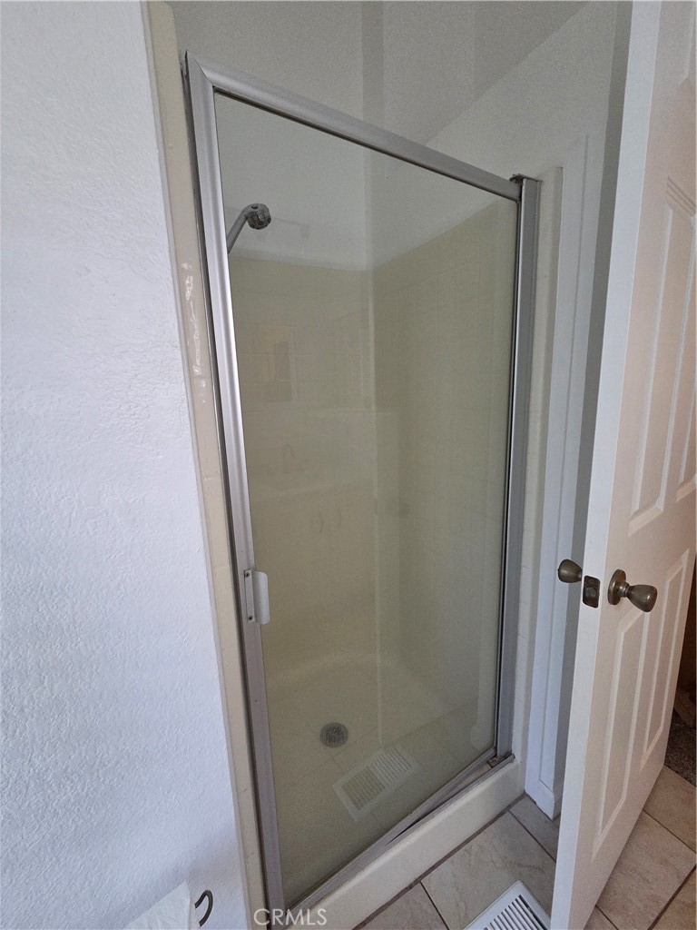 2920 Clark Road, Unit K2 Butte Valley, CA 95965 - Photo 24 of 36 a bathroom with a glass shower door