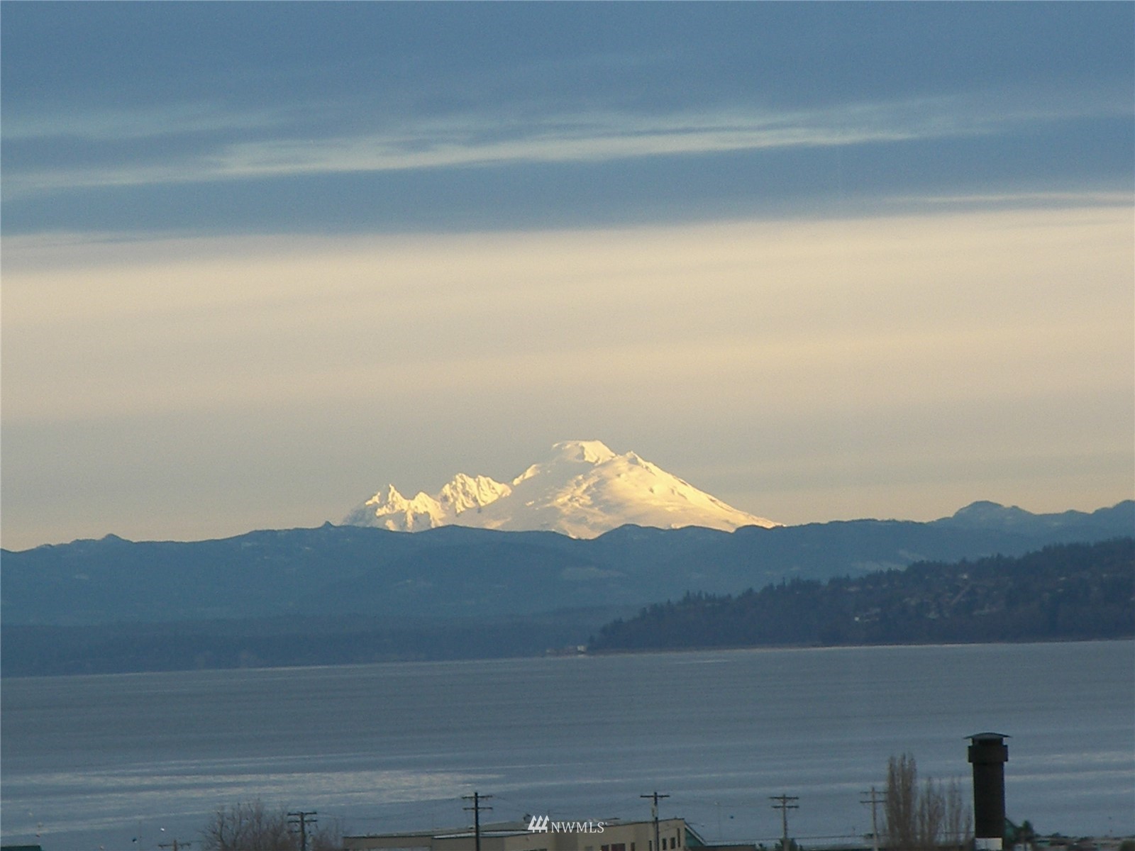 75 Pine Street, Unit 205 Edmonds, WA 98020 - Photo 1 of 33 a view of a lake and a mountain