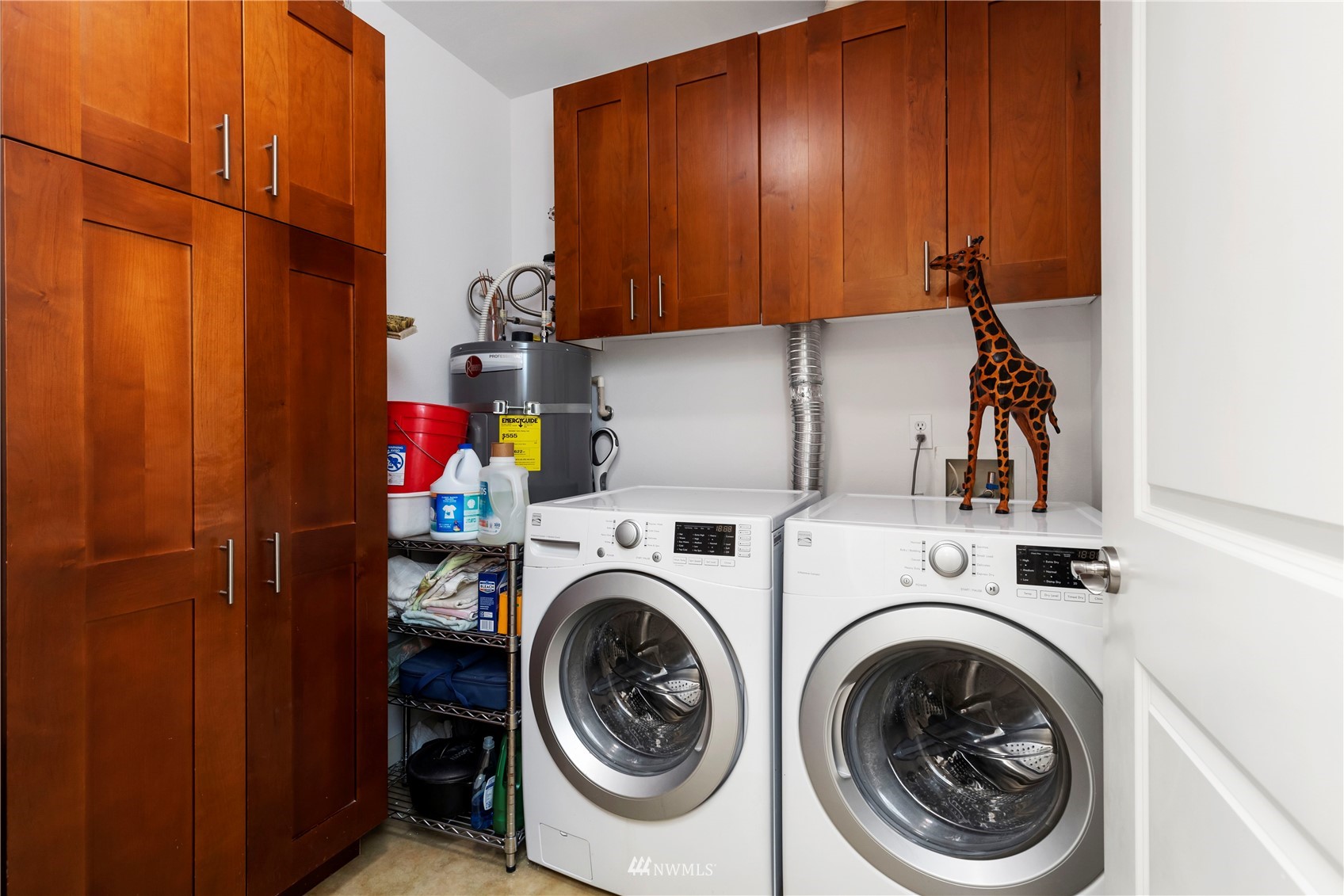 75 Pine Street, Unit 205 Edmonds, WA 98020 - Photo 21 of 33 a utility room with dryer and washer