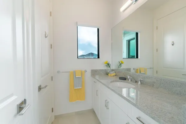 a view of a lake with a yard