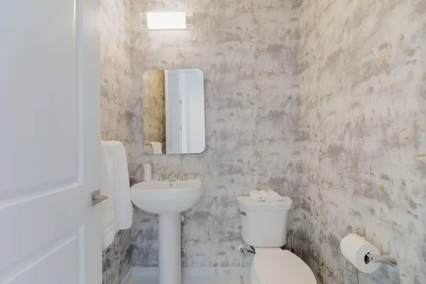 a living room with fireplace furniture and a baby crib