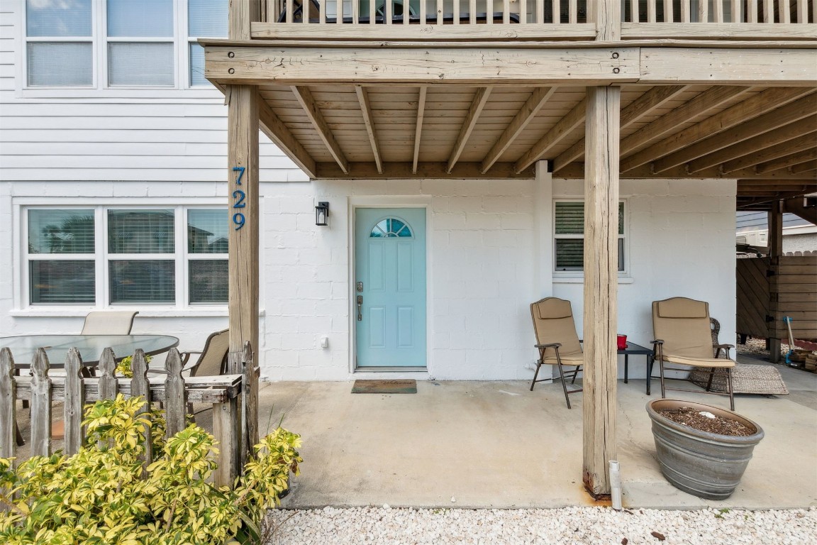 729 North Fletcher Avenue Fernandina Beach, FL 32034 - Photo 1 of 25 a building outdoor space with patio furniture and potted plants