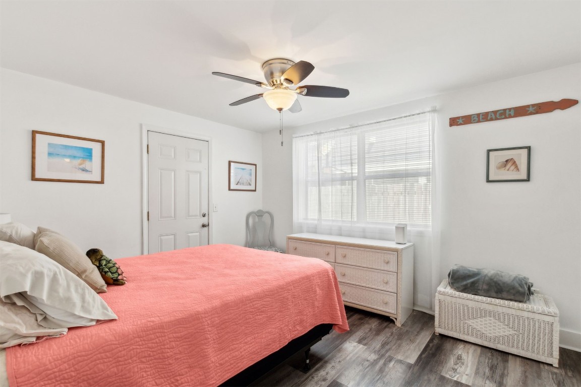 729 North Fletcher Avenue Fernandina Beach, FL 32034 - Photo 13 of 25 a bedroom with a bed and a window