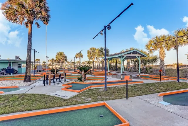 a view of a park with swings
