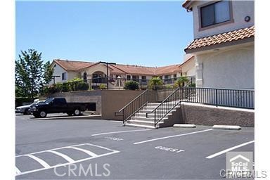 9033 Grand Circle Cypress, CA 90630 - Photo 1 of 1 a view of a car park in front of a building