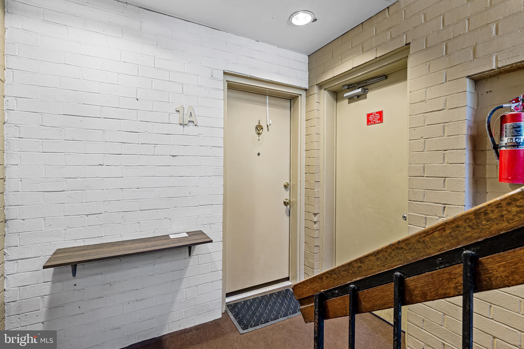 1 Cross Keys Road, Unit 1A Baltimore, MD 21210 - Photo 51 of 52 front door of 1A w easy access to storage locker.
