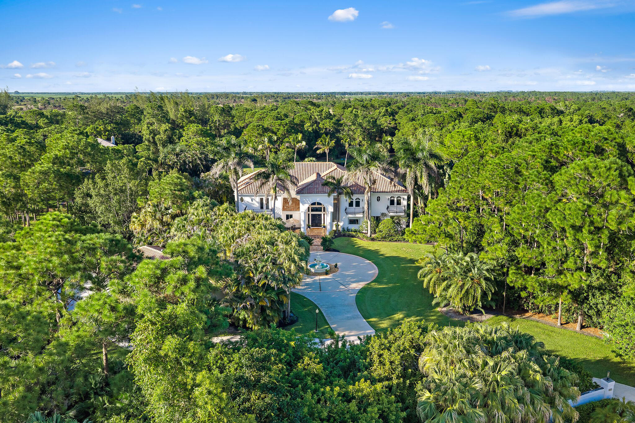 2584 Southeast Ranch Acres Circle Jupiter, FL 33478 - Photo 78 of 83 Aerial View of the Private Grounds