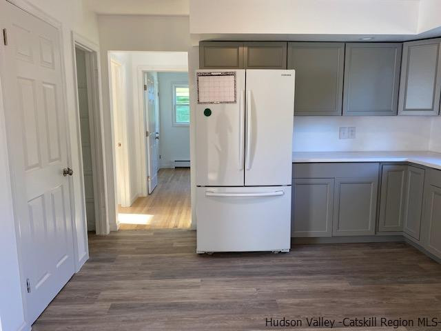 4 Gate Road Highland, NY 12528 - Photo 5 of 28 a white refrigerator freezer sitting inside of a kitchen