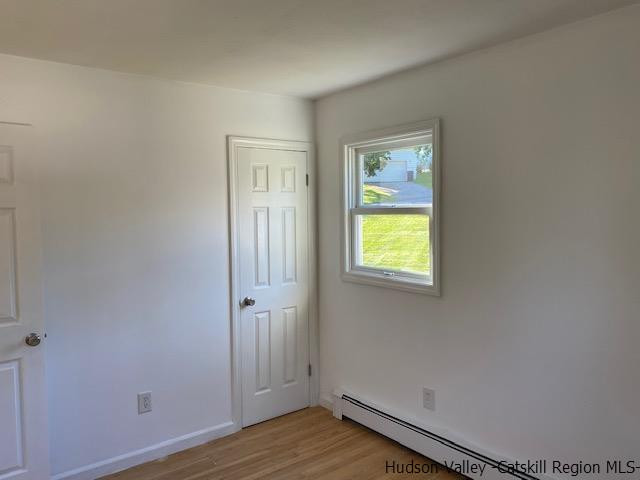 4 Gate Road Highland, NY 12528 - Photo 9 of 28 an empty room with wooden floor and windows