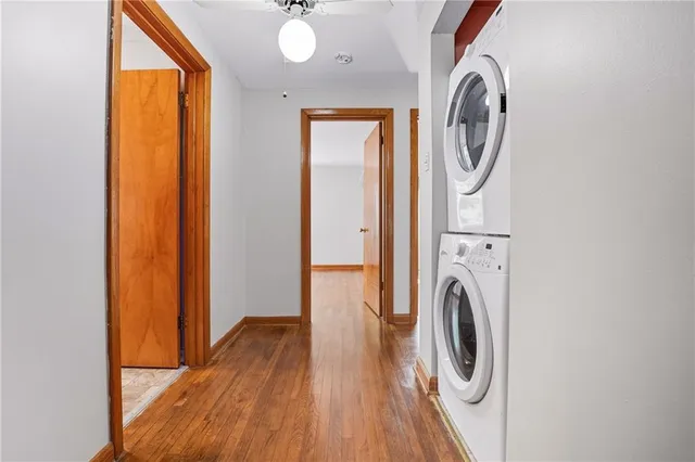 a view of a hallway with washer and dryer