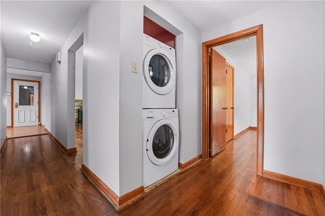 a view of a hallway with washer and dryer