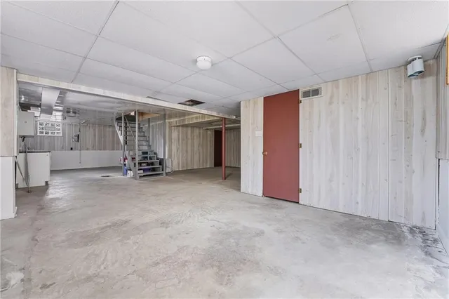 a view of a livingroom with a staircase