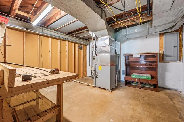 a view of a room with wooden walls