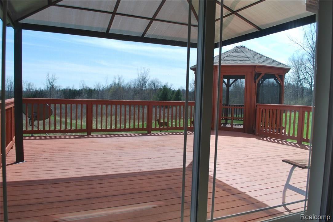 5365 Hollenbeck Road Columbiaville, MI 48421 - Photo 22 of 48 Another Deck View from Inside - Copy.JPG