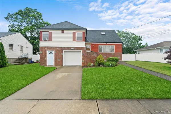 a front view of house with yard