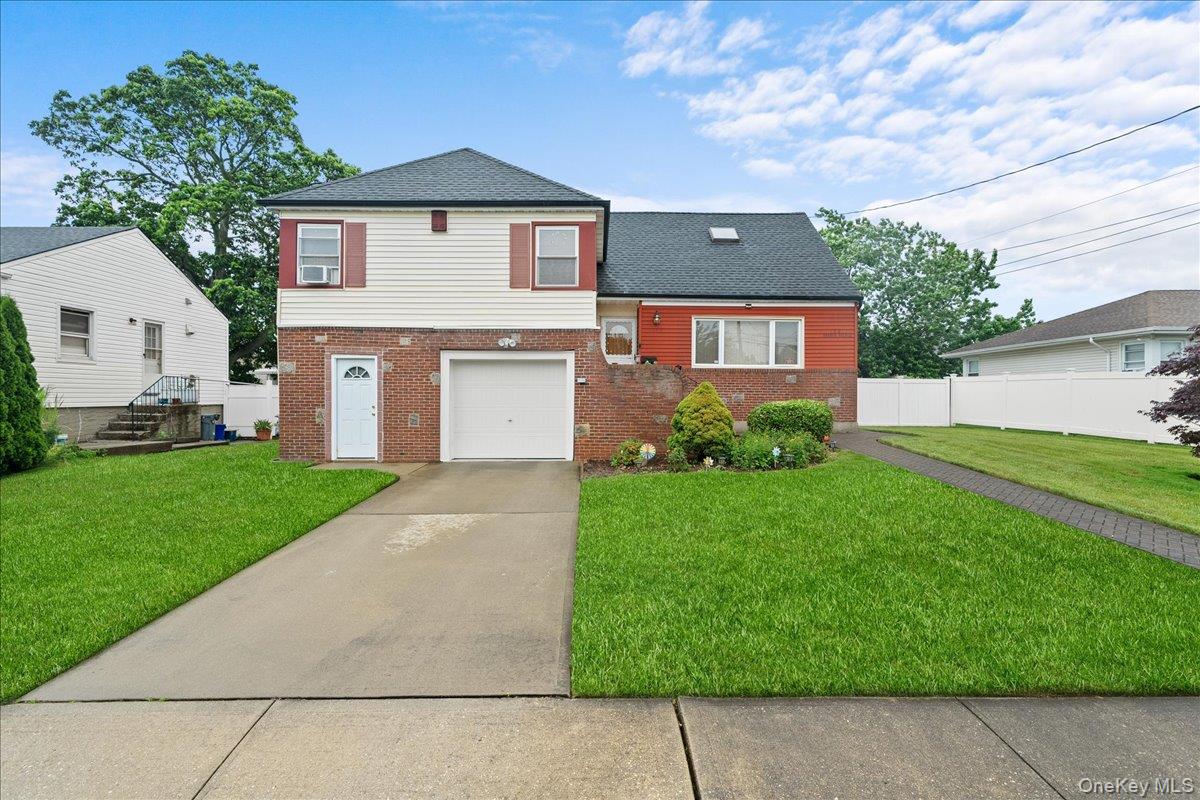 a front view of house with yard