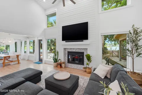 a stove top oven sitting inside of a kitchen