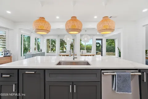 a very nice looking room with wooden floor and a window