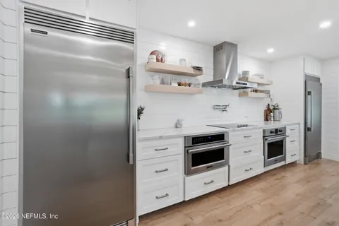 a view of a balcony with an outdoor space