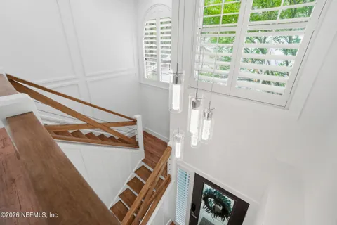 a table and chairs in front of a building