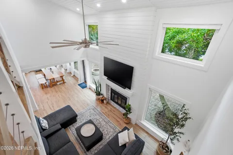 a dining room with furniture and a fireplace