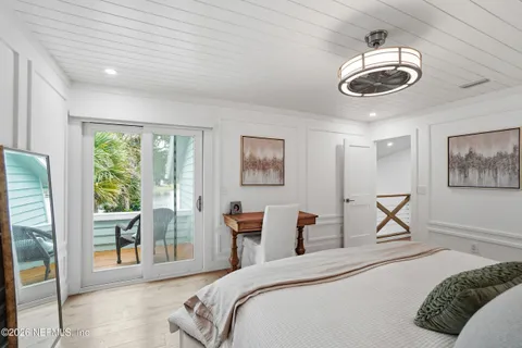 a front view of a house with wooden stairs