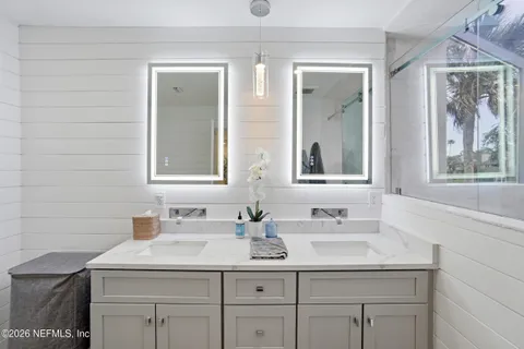 a view of a lake in middle of forest