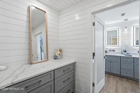 an aerial view of a house with a lake view